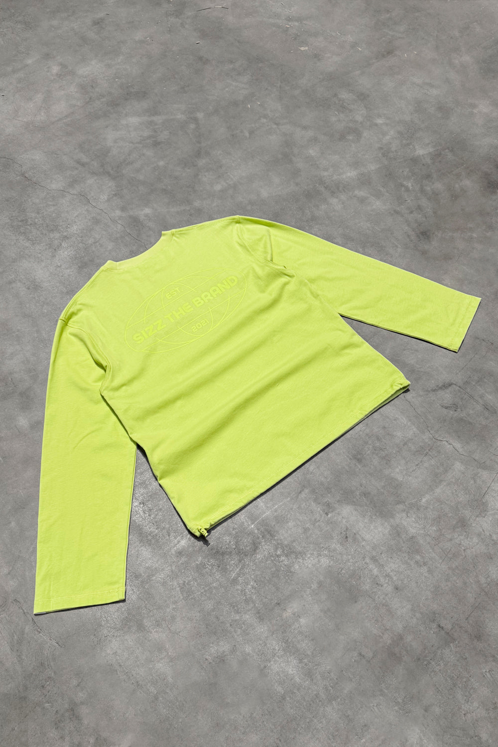 SIZZ Worldwide Langarmshirt Limettengelb