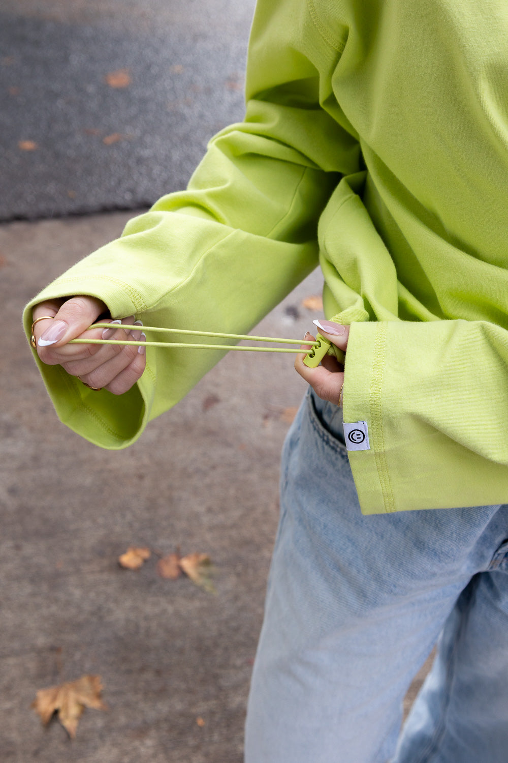 SIZZ Worldwide Langarmshirt Limettengelb